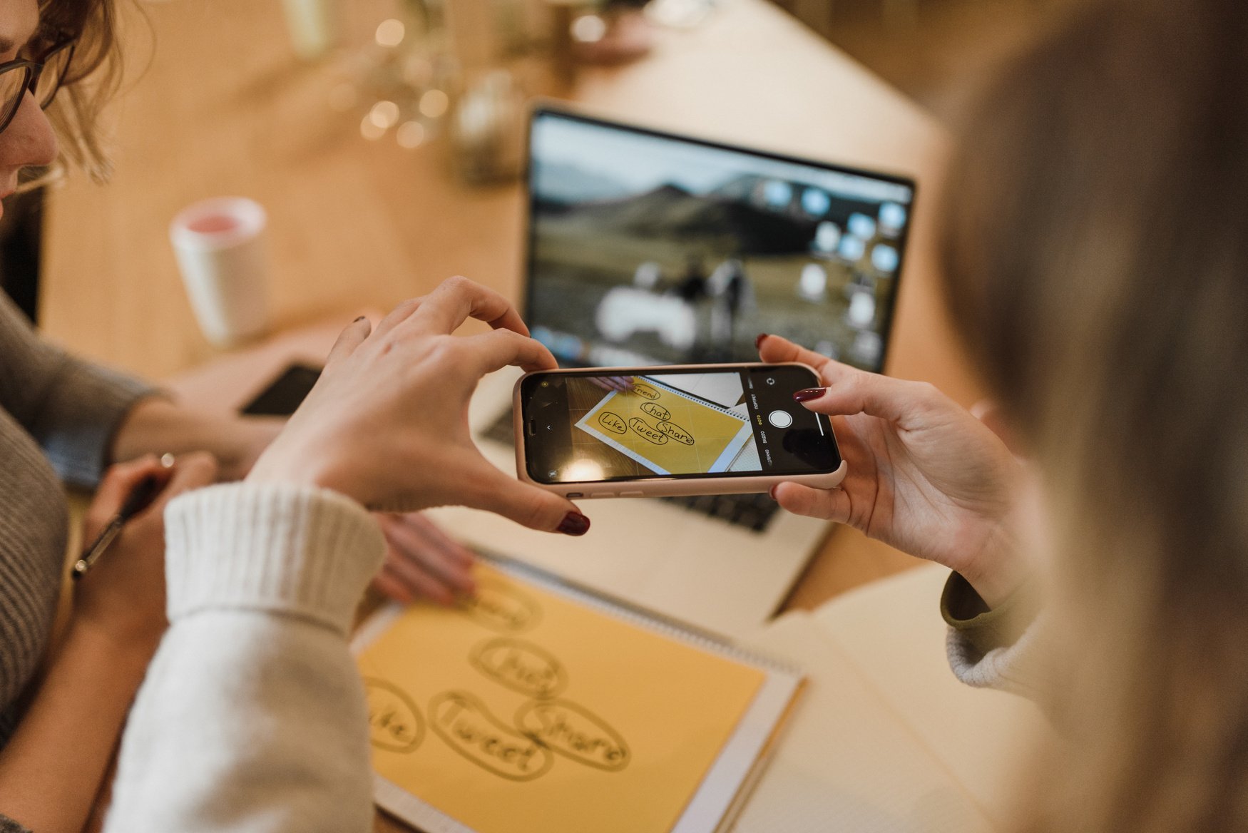 Person Holding Black Smartphone Taking Photo of People